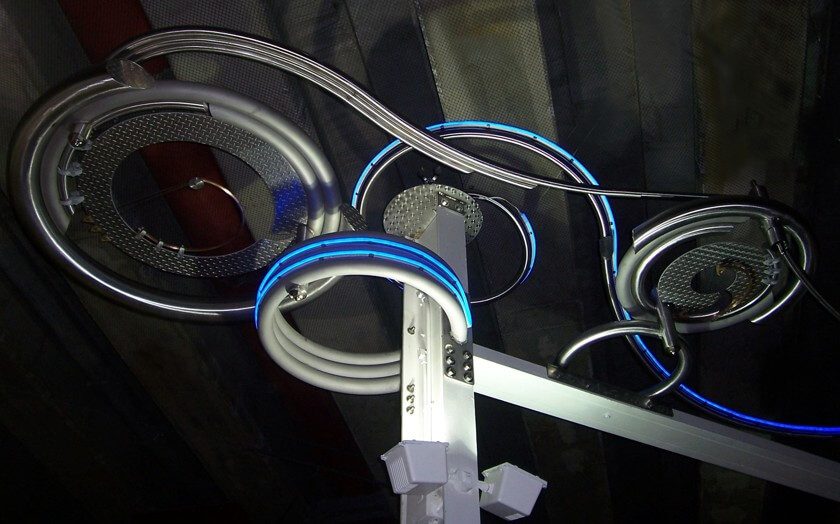 A Roller and Conveyer on Ceiling With Blue Light
