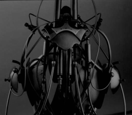 A Metallic Armor Shot on a Dark Themed Light A Metallic Armor Shot on a Dark Themed Light