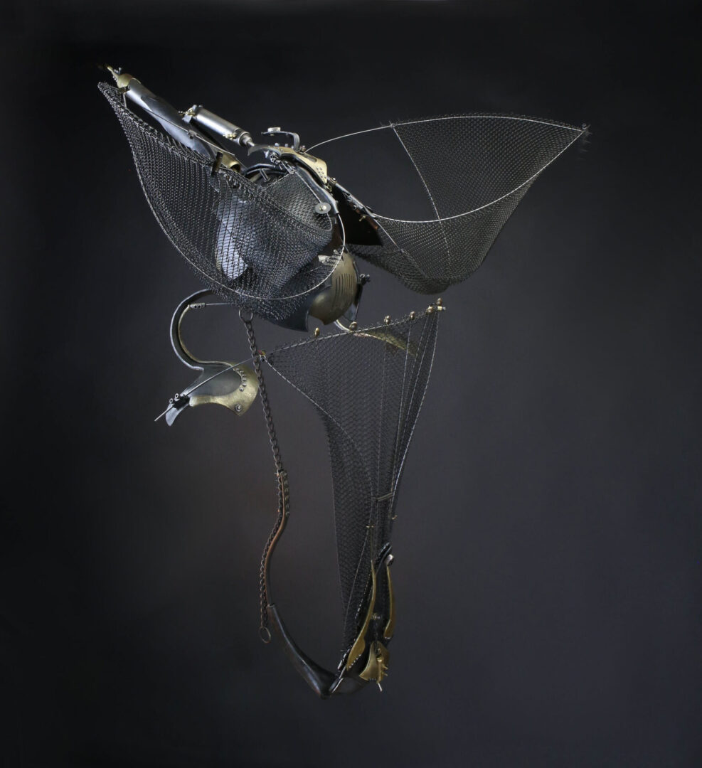 An interactive sculpture of a bird on a black background.