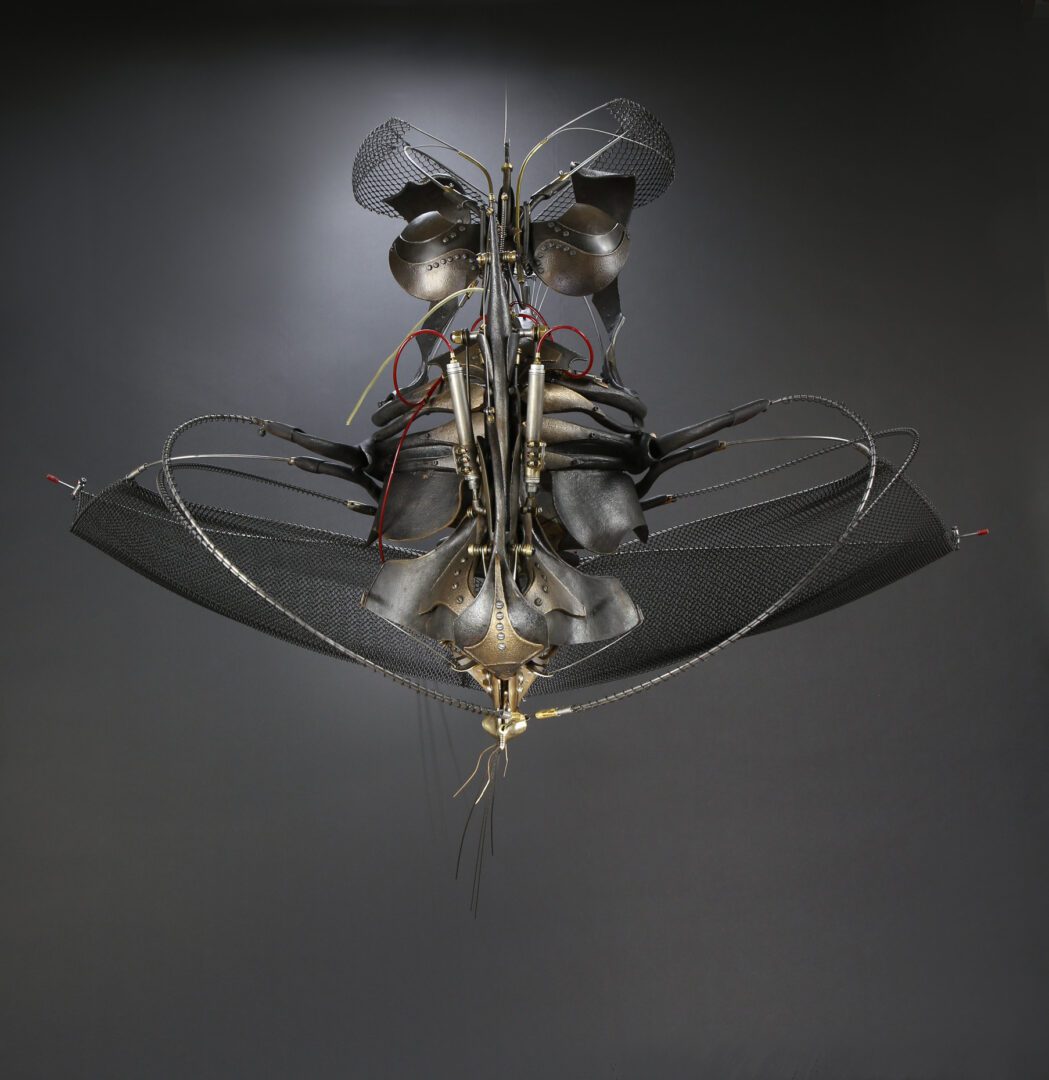 An interactive metal sculpture suspended from the ceiling.