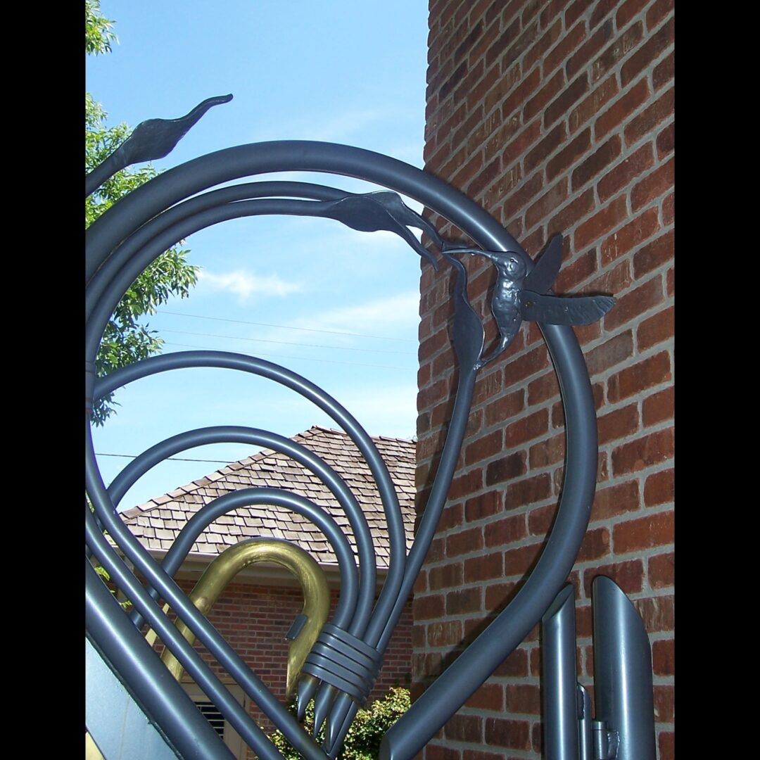 A metal gate with a heart on it.